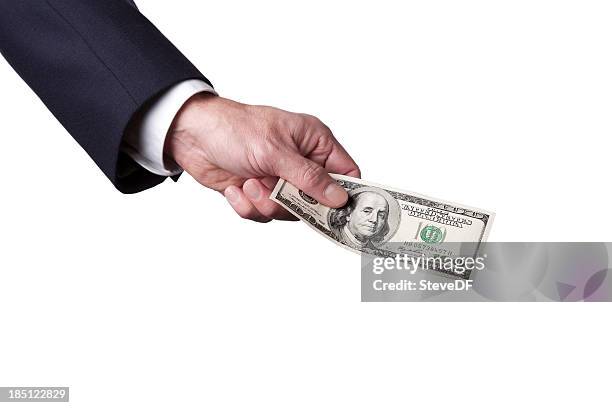 businesman's hand holding a us 100 dollar bill - mouw stockfoto's en -beelden