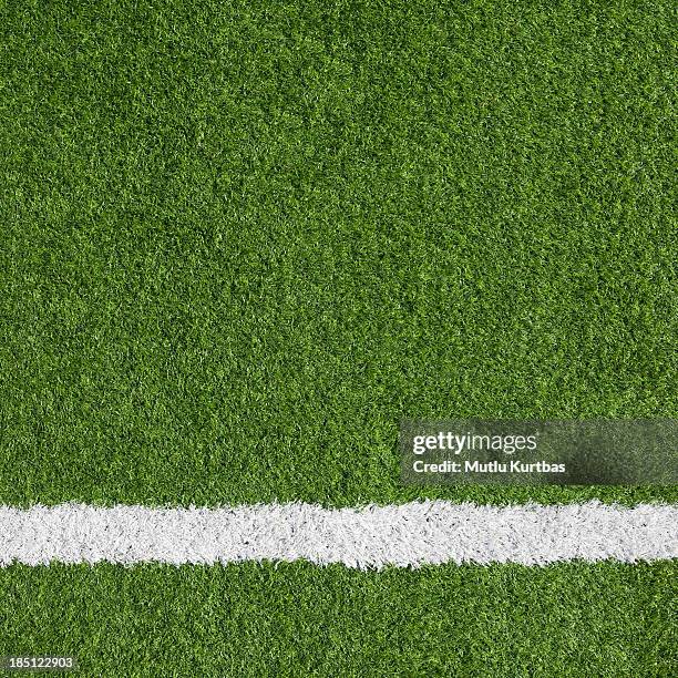 close-up of a boundary line on a soccer field - football field stockfoto's en -beelden