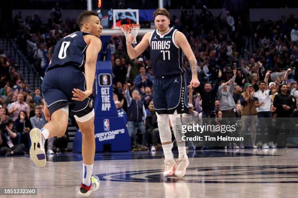 Luka Doncic of the Dallas Mavericks reacts after a basket by Dante Exum of the Dallas Mavericks in the second half against the Los Angeles Lakers at...
