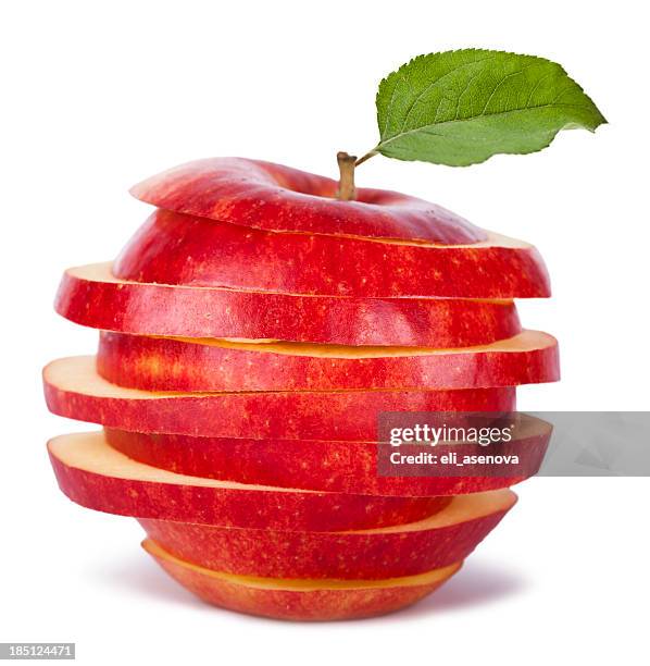 sliced red apple and leaf - apple slice stock pictures, royalty-free photos & images