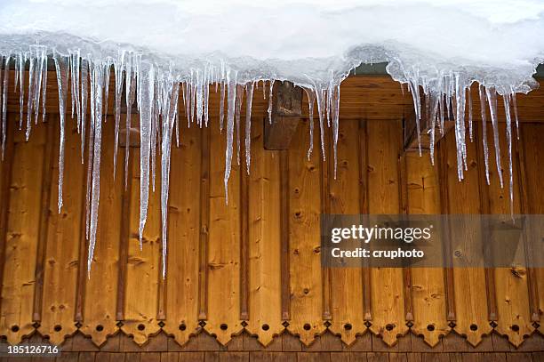 icicles on the roof - pointy architecture stock pictures, royalty-free photos & images