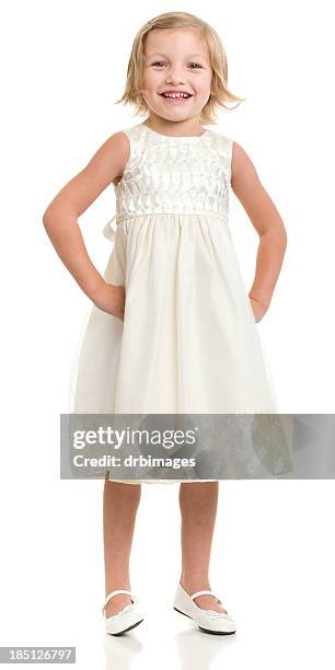 happy little girl standing en vestido - cut out dress fotografías e imágenes de stock