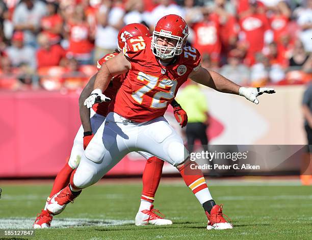 Offensive tackle Eric Fisher of the Kansas City Chiefs gets set on the line against the Oakland Raiders during the first half on October 13, 2013 at...