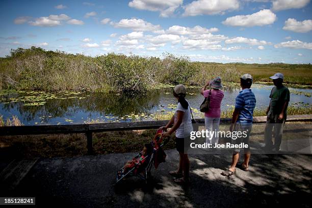 Visitors to the Everglades National Park enjoy the views after it reopened to visitors today, following a 16-day closure stemming from the partial...