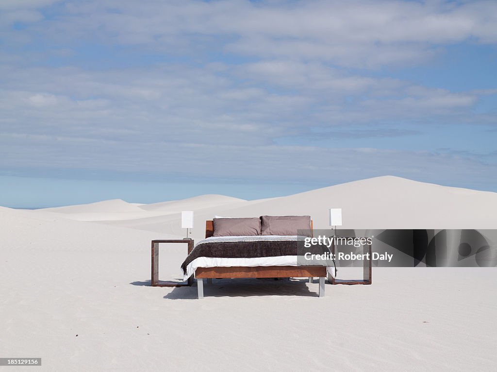 An empty bed in the middle of the desert