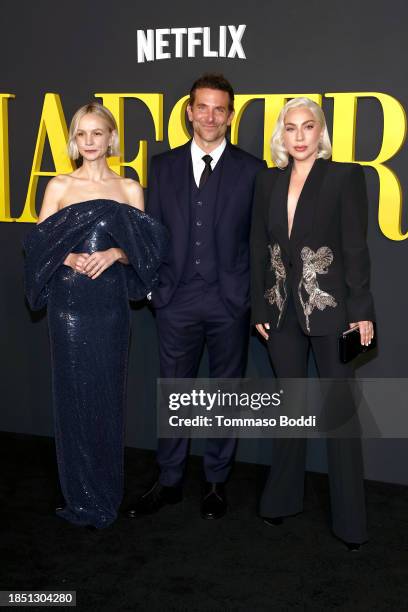 Carey Mulligan, Bradley Cooper, and Lady Gaga attend Netflix's "Maestro" Los Angeles photo call at Academy Museum of Motion Pictures on December 12,...