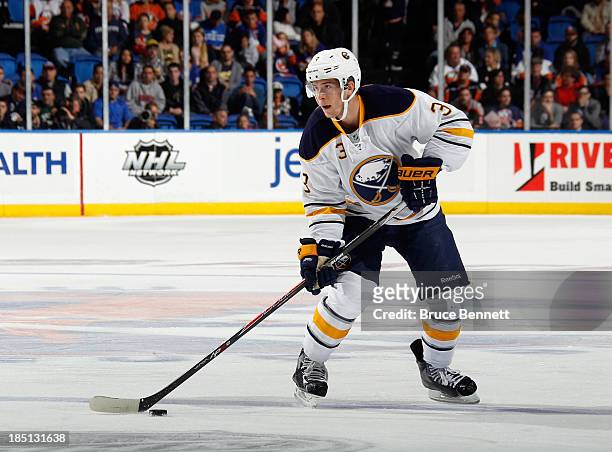 Mark Pysyk of the Buffalo Sabres skates against the New York Islanders at the Nassau Veterans Memorial Coliseum on October 15, 2013 in Uniondale, New...