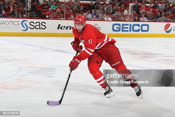 Jordan Staal of the Carolina Hurricanes skates with the puck during their NHL game against the Chicago Blackhawks at PNC Arena on October 15, 2013 in...