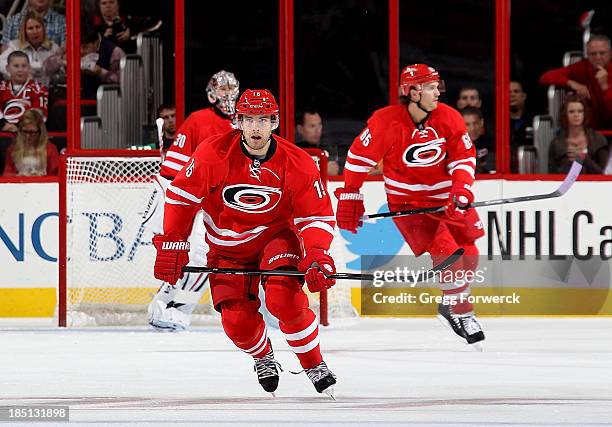 Tuomo Ruutu of the Carolina Hurricanes skates for position on the ice during their NHL game against the Chicago Blackhawks at PNC Arena on October...