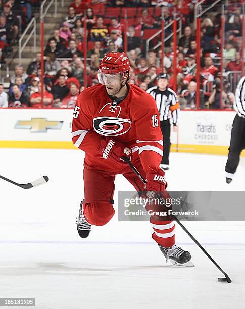 Tuomo Ruutu of the Carolina Hurricanes controls the puck on the ice against the Chicago Blackhawks during their NHL game at PNC Arena on October 15,...