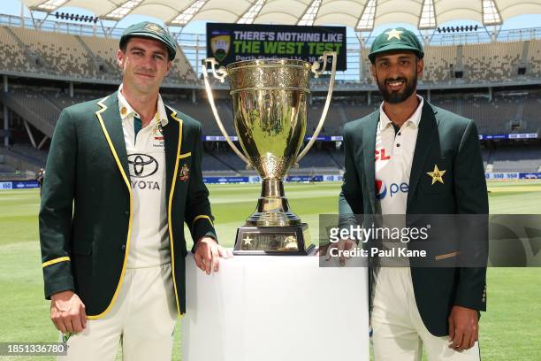Pat Cummins of Australia and Shan Masood of Pakistan pose with the Benaud-Qadir Trophy ahead of the Australia v Pakistan - Men's 1st Test Match at...
