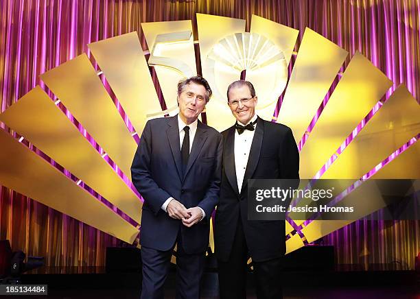 Bryan Ferry and Edouard Ettedgui, Chief Executive of Mandarin Oriental Hotel Group, at Mandarin Oriental Hong Kong's 50th Anniversary Gala on October...