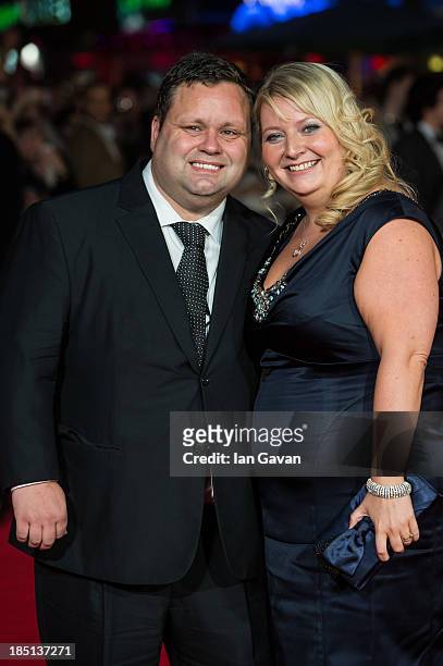 Paul Potts and his wife Julie-Ann Potts attend the European premiere of "One Chance" at The Odeon Leicester Square on October 17, 2013 in London,...