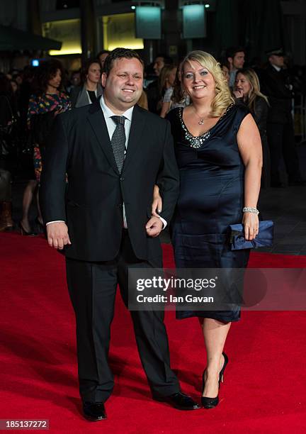 Paul Potts and his wife Julie-Ann Potts attend the European premiere of "One Chance" at The Odeon Leicester Square on October 17, 2013 in London,...