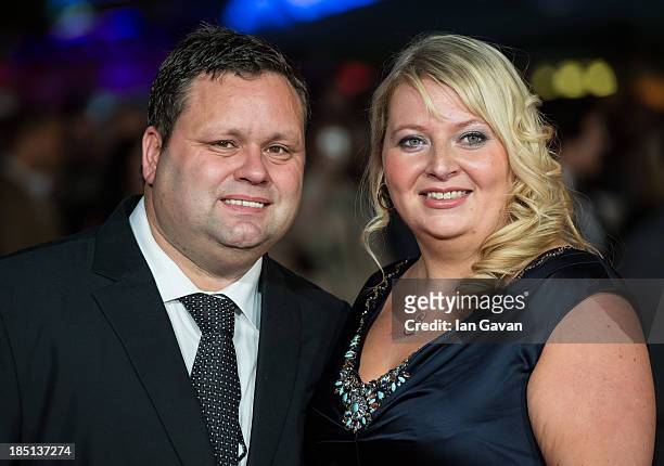 Paul Potts and his wife Julie-Ann Potts attend the European premiere of "One Chance" at The Odeon Leicester Square on October 17, 2013 in London,...