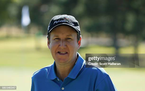 Henry walks off the ninth green after finishing with an 11-under par 60 during the first round of the Shriners Hospitals for Children Open at TPC...