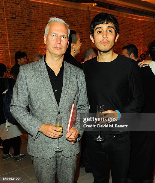 Klaus Biesenbach and Adrian Villar Rojas attend a cocktail party to Celebrate the Launch of the Book "Chloe Attitudes" hosted by Sarah Mower and Marc...