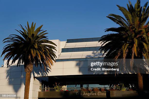 Palm trees stand outside the Los Angeles Times Olympic Press facility in Los Angeles, California, U.S, on Wednesday, Oct. 16, 2013. Congress ended...