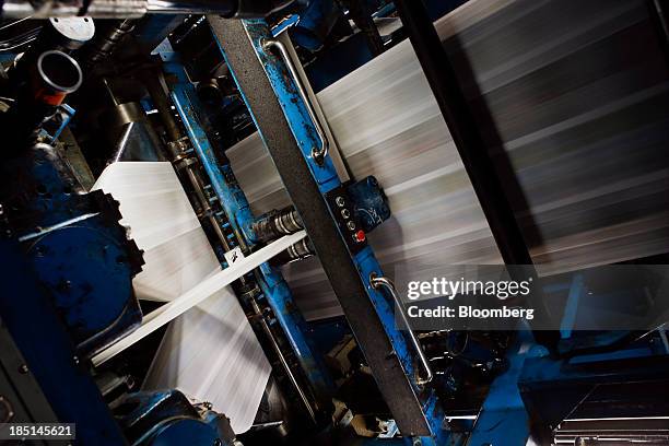 The Los Angeles Times newspaper is printed at the Olympic Press facility in Los Angeles, California, U.S, on Wednesday, Oct. 16, 2013. Congress ended...