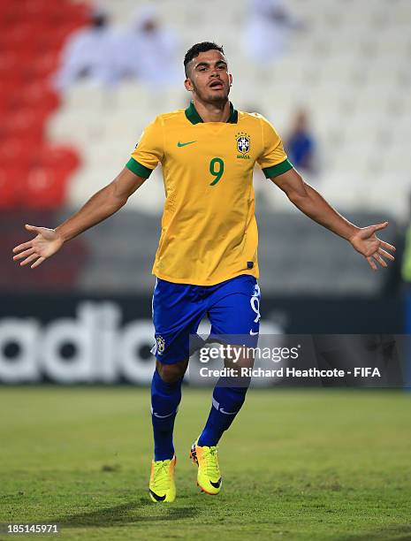 Mosquito of Brazil celebrates scoring his third goal during the FIFA U-17 World Cup UAE 2013 group A match between Brazil and Slovakia at the Mohamed...