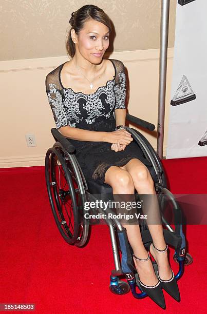 Model/actress Angela Rockwood arrives at the 2013 Media Access Awards at The Beverly Hilton Hotel on October 17, 2013 in Beverly Hills, California.