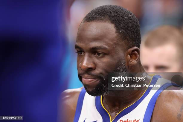 Draymond Green of the Golden State Warriors reacts after being ejected for a flagrant foul during the second half of the NBA game against the Phoenix...