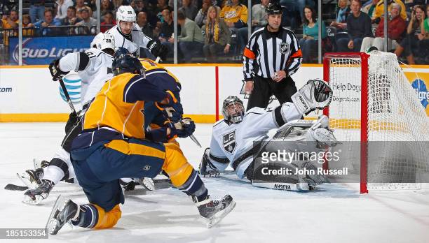 Matt Cullen of the Nashville Predators puts the puck in the net against Jonathan Quick of the Los Angeles Kings at Bridgestone Arena on October 17,...
