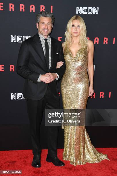 Patrick Dempsey and Jillian Fink attend the premiere of Neon's "Ferrari" at Directors Guild Of America on December 12, 2023 in Los Angeles,...