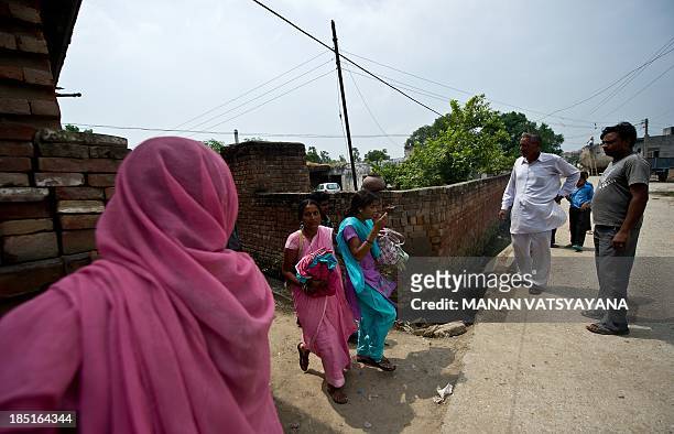 India-crime-social-trafficking-children,FEATURE by Trudy Harris In this photograph taken on September 16 an alleged Indian human-trafficking victim...