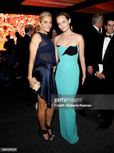 Co-Chair Jamie Tisch and model Amber Valletta, wearing Ferragamo, attend the Wallis Annenberg Center for the Performing Arts Inaugural Gala presented...