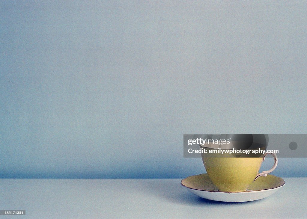 Yellow vintage teacup