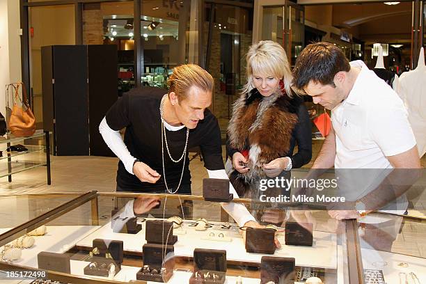 Brand Ambassador Kether Parker helps guests during the Barneys New York And Renee Parsons Host A Cocktail Event In Support Of Free Arts Arizona at...