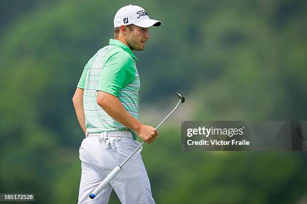 Ben Campbell of New Zealand walks on the 13rd green during day two of the Venetian Macau Open at Macau Golf and Country Club on October 18, 2013 in...