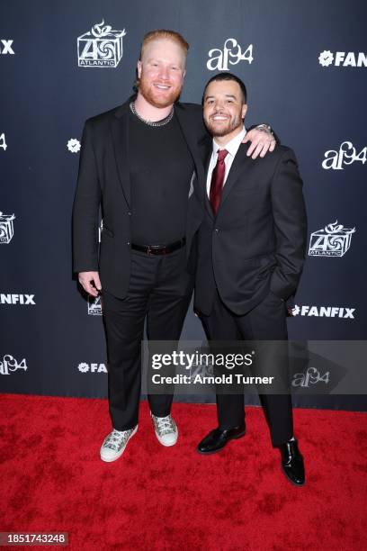 Noah Aussems and Sevian Frangipane attend Fanfix x Atlantic Records Holiday Party at Petersen Automotive Museum on December 12, 2023 in Los Angeles,...