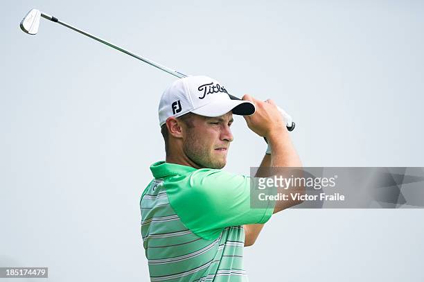 Ben Campbell of New Zealand tees off on the 17th hole during day two of the Venetian Macau Open at Macau Golf and Country Club on October 18, 2013 in...