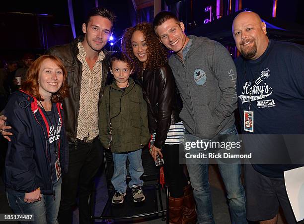Cast of TV's Nashville, Actors Sam Palladio, Chaley Rose and Chris Carmack with Erin Smith holding 7 year old Kenny Smith who suffers from Crohns &...