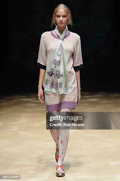 Model showcases designs on the runway during the In-Process by Hall Ohara show as part of Mercedes Benz Fashion Week TOKYO 2014 S/S at the Hikarie...