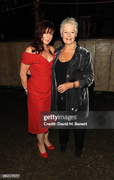 Finty Williams and Dame Judi Dench arrive at the Shakespeare's Globe Gala Dinner hosted by Zoe Wanamaker on October 17, 2013 in London, England.