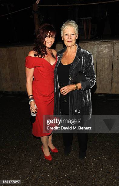 Finty Williams and Dame Judi Dench arrive at the Shakespeare's Globe Gala Dinner hosted by Zoe Wanamaker on October 17, 2013 in London, England.