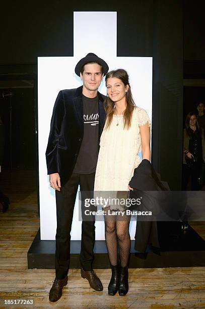 Models Jamie Burke and Mila De Witt attend the Burberry Brit Rhythm Men's Launch in New York at Irving Plaza on October 17, 2013 in New York City.