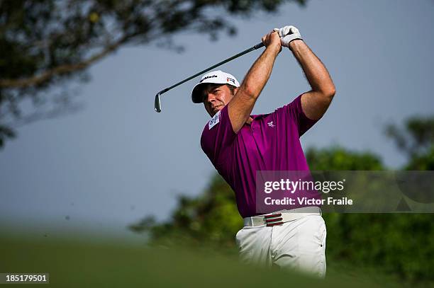 Scott Barr of Australia tees off on the 14th hole during day two of the Venetian Macau Open at Macau Golf and Country Club on October 18, 2013 in...