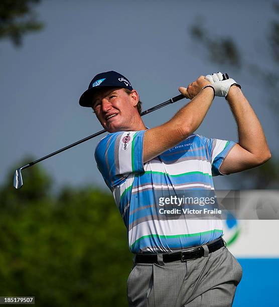 Ernie Els of South Africa tees off on the 14th hole during day two of the Venetian Macau Open at Macau Golf and Country Club on October 18, 2013 in...