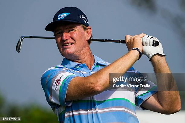 Ernie Els of South Africa tees off on the 14th hole during day two of the Venetian Macau Open at Macau Golf and Country Club on October 18, 2013 in...