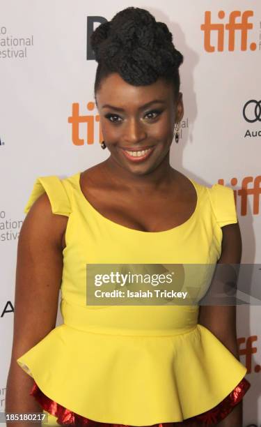 Novelist Chimamanda Ngozi Adichie arrives at the 'Half Of A Yellow Sun' Premiere during the 2013 Toronto International Film Festival at Winter Garden...
