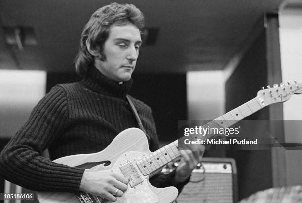 Guitarist Denny Laine, of pop group Wings, in a recording studio, 21st November 1973.