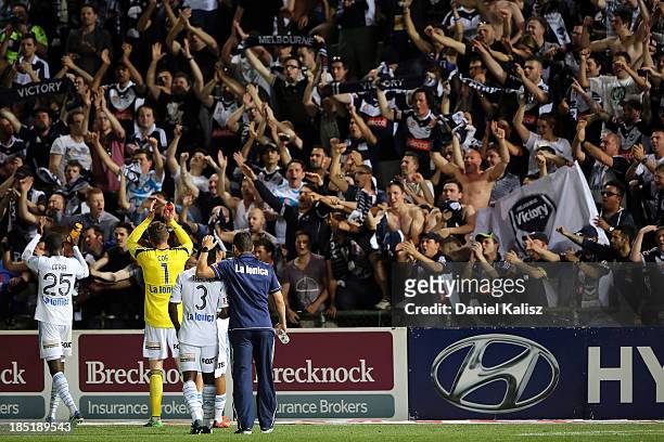 Victory players salute their fans during the round two A-League match between Adelaide United and Melbourne Victory at Coopers Stadium on October 18,...