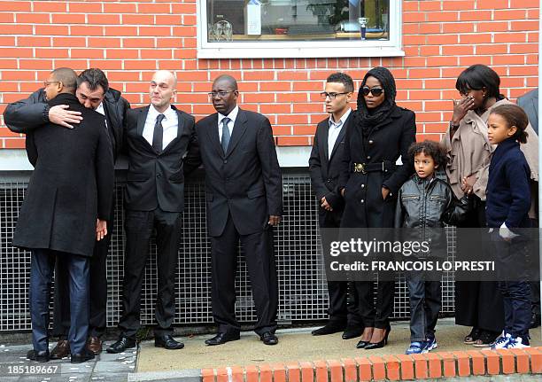 The widow of French football coach Bruno Metsu, Viviane Metsu , her children and relatives leave the Stade des Frandres in Dunkirk, northern France,...