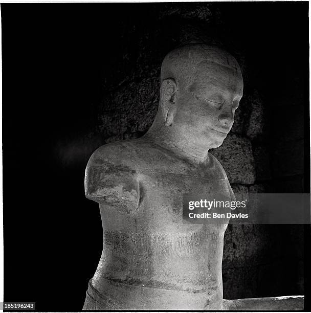 An imposing stone statue of Jayavarman VII at Prasat Hin Phimai, an imposing stone sanctuary built by the Khmers in Thailand's Northeast. From the...