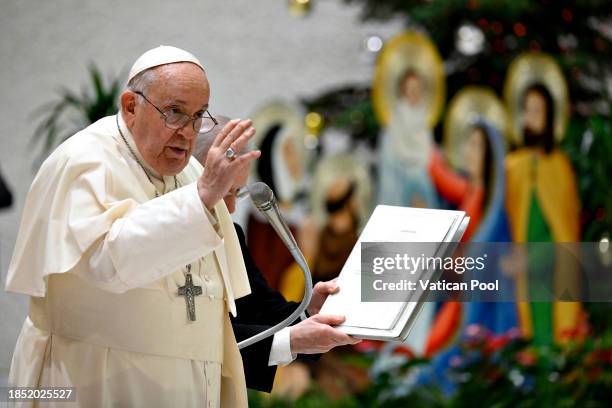 Pope Francis blesses faithful during the weekly General Audience at the Paul VI Hall on December 13, 2023 in Vatican City, Vatican. Speaking at the...