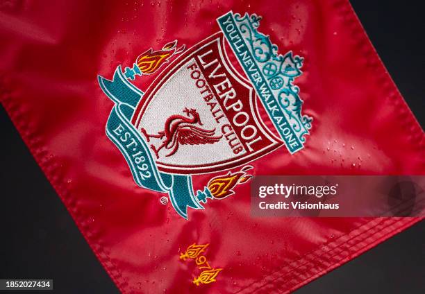 The Liverpool club badge on a corner flag during the Premier League match between Liverpool FC and Fulham FC at Anfield on December 3, 2023 in...